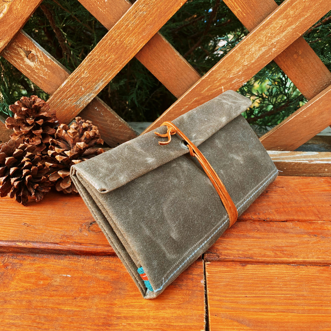 homemade tobacco pouch Hand made leather brown tobacco-pouch on wood background. DIY Stock Photo Tobacco leaf smoker's pouch |